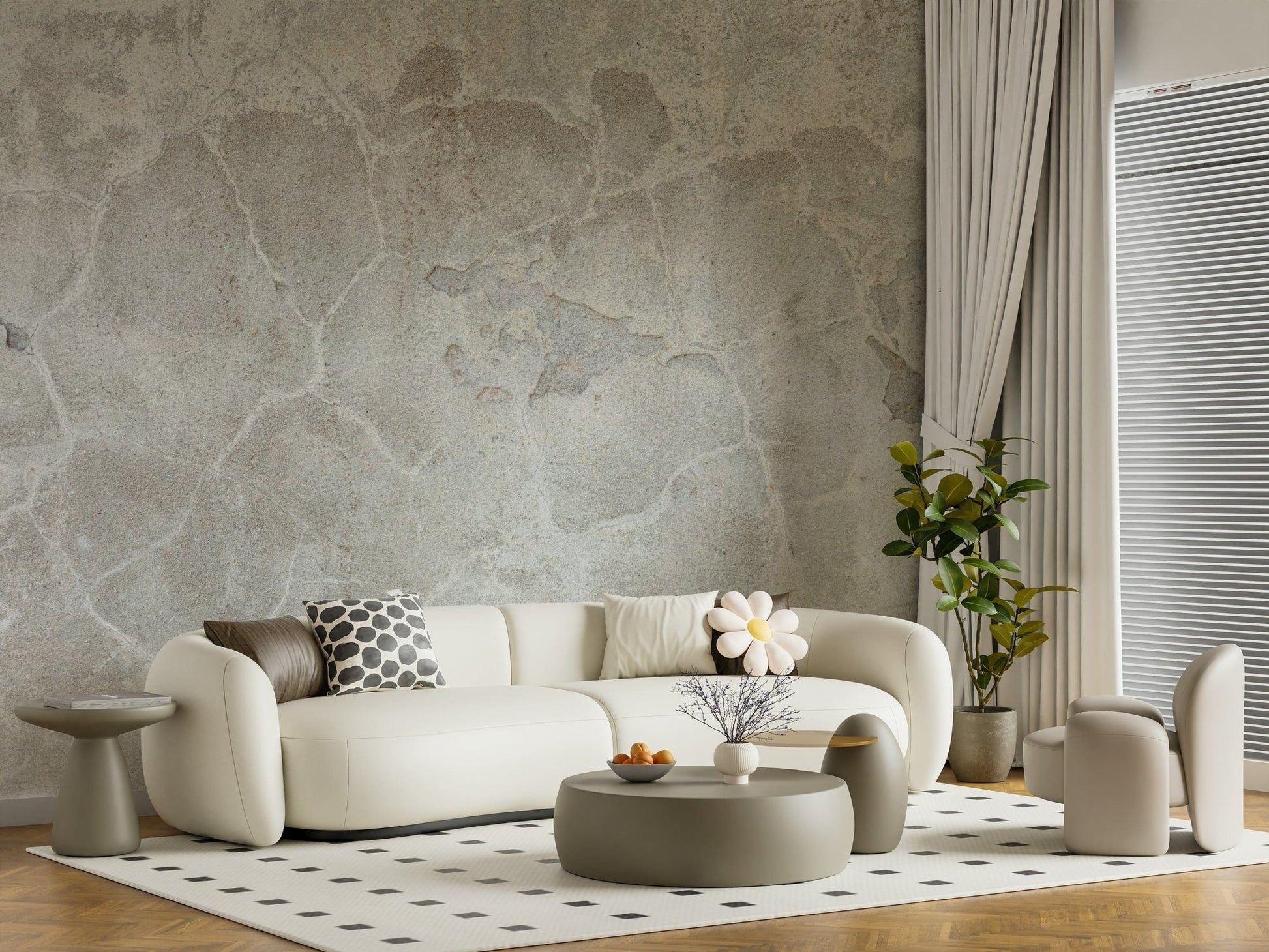 Urban Texture wallpaper mural in gray concrete behind a curved cream sofa and sage round coffee table
