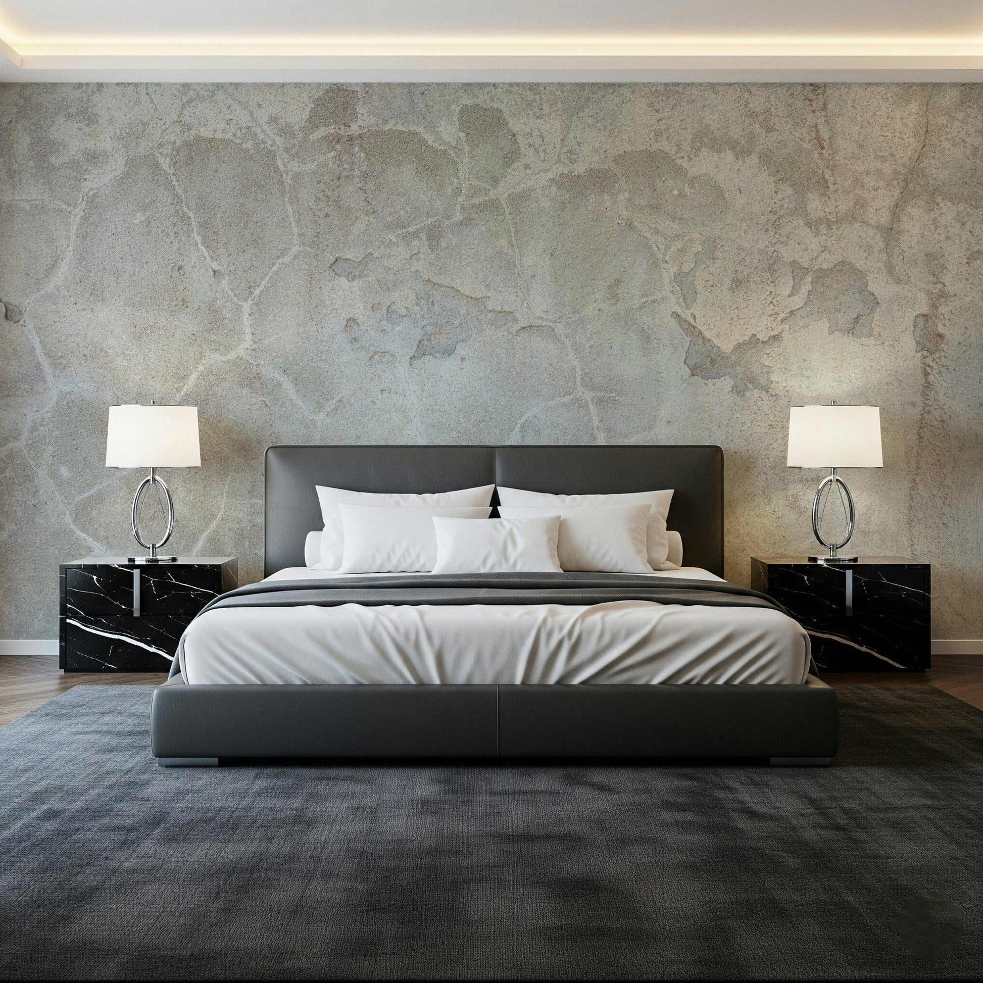 Urban Texture wallpaper mural in distressed gray concrete behind a dark leather bed and marble nightstands