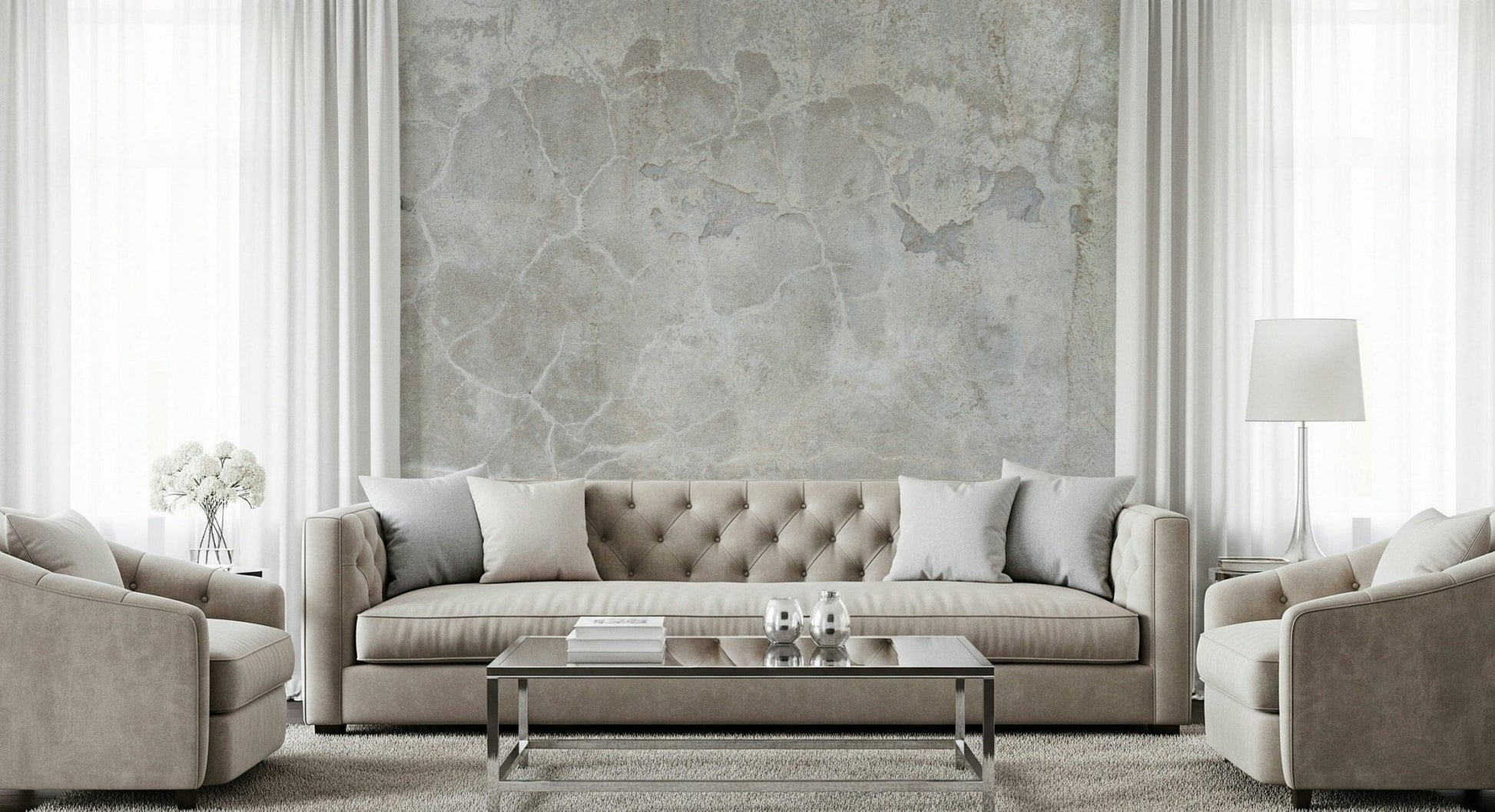 Urban Texture wallpaper mural in gray concrete behind a beige tufted sofa and mirrored coffee table