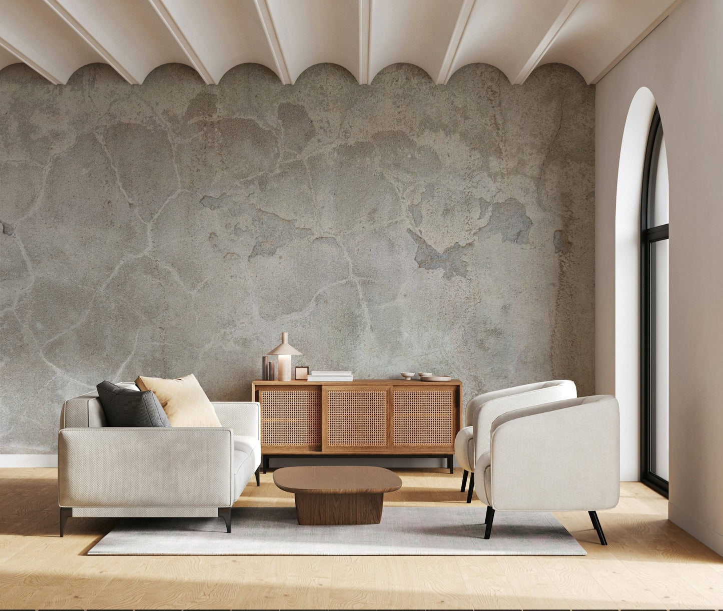 Urban Texture wallpaper mural in gray concrete behind a cream sofa and cane sideboard under a scalloped ceiling