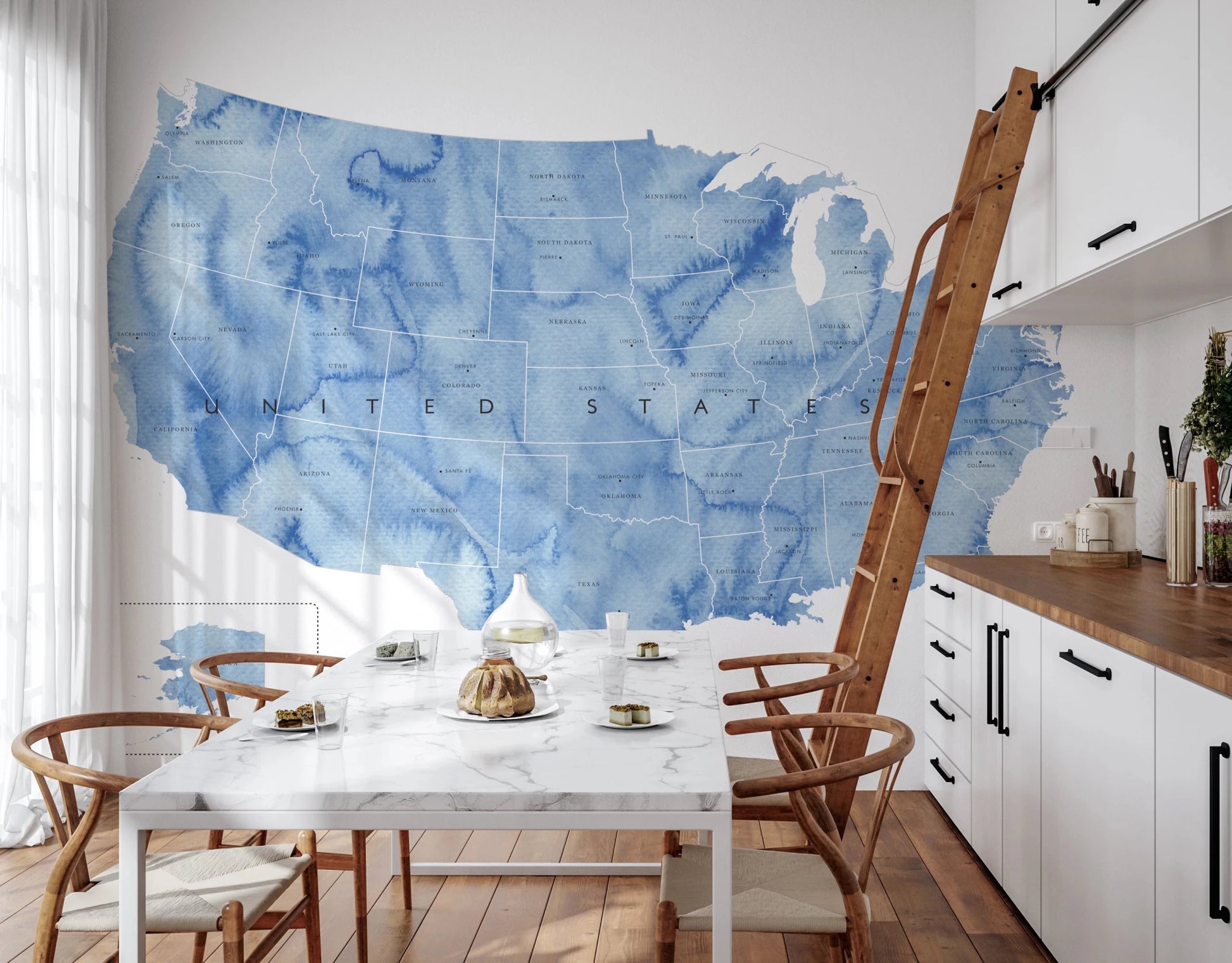 USA map with states and capitals in blue watercolor wallpaper mural in a kitchen dining nook with a marble table