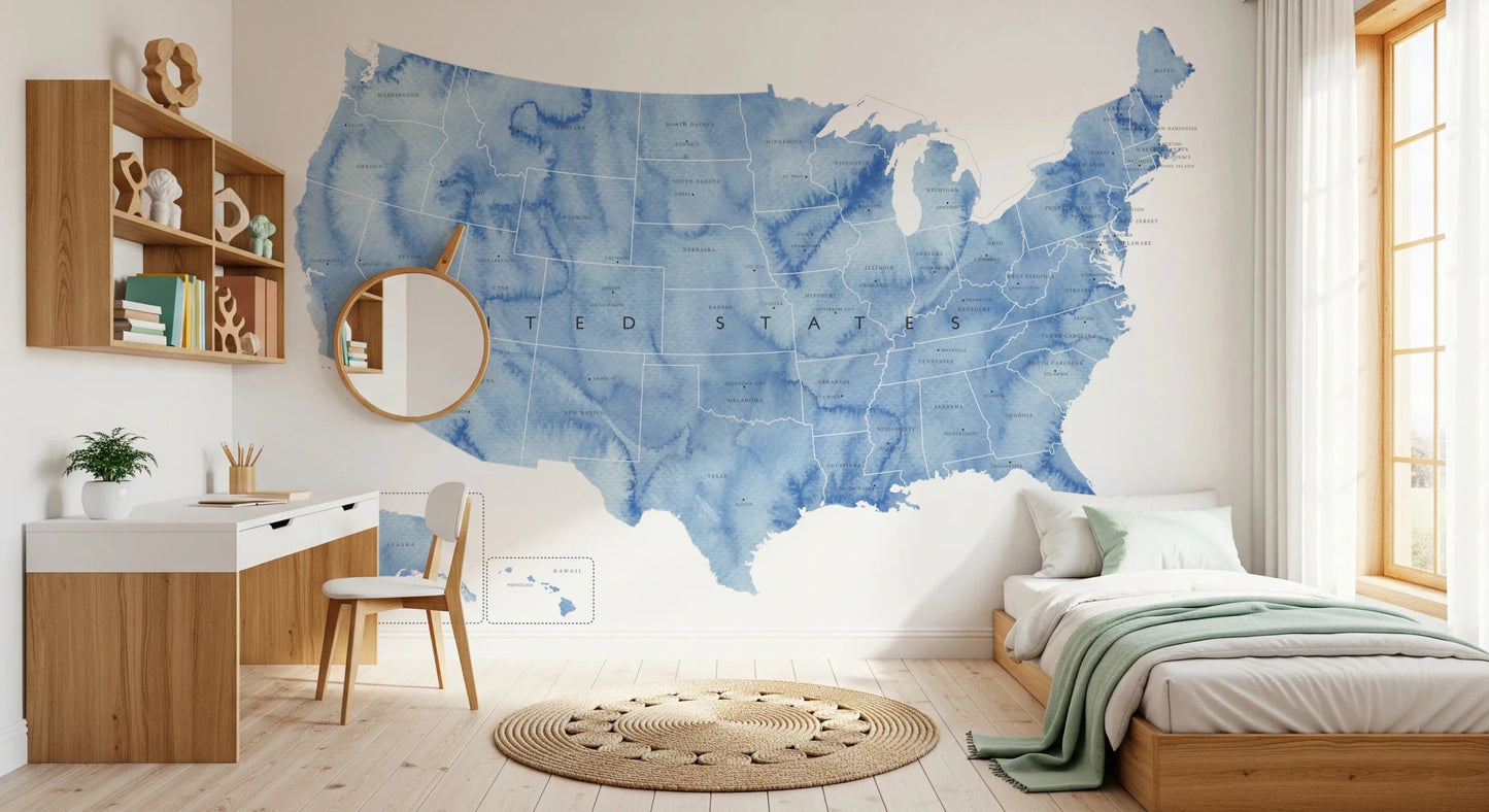 USA map with states and capitals in blue watercolor wallpaper mural in a kids bedroom with a wood bed and green throw