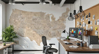 USA map with states and capitals in tan watercolor wallpaper mural in a home office with dual monitors and a desk