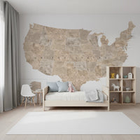 USA map with states and capitals in tan watercolor wallpaper mural in a kids bedroom with a wood bed and toy shelf