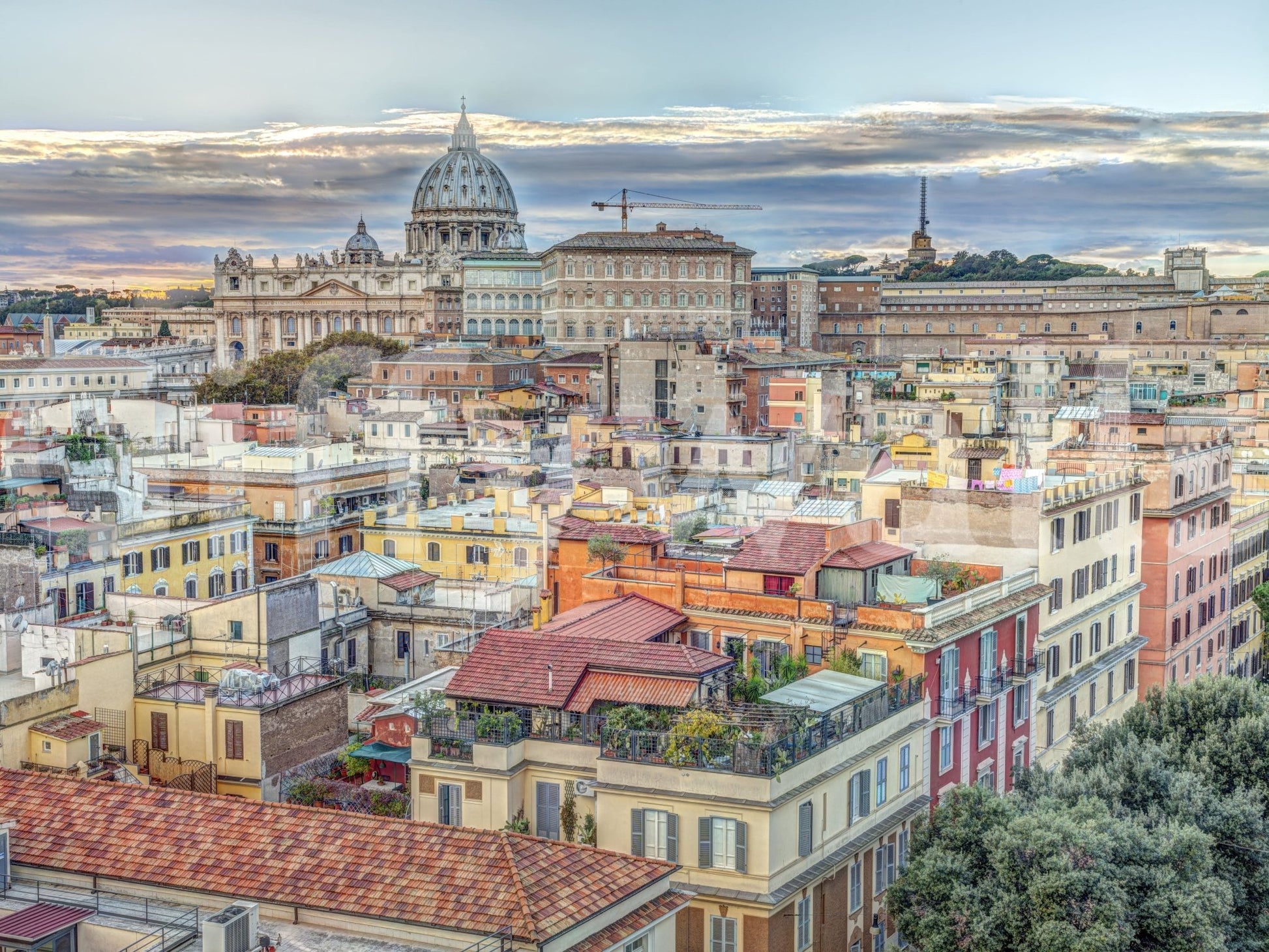 Rooftop view of Vatican City mural with domed basilica

