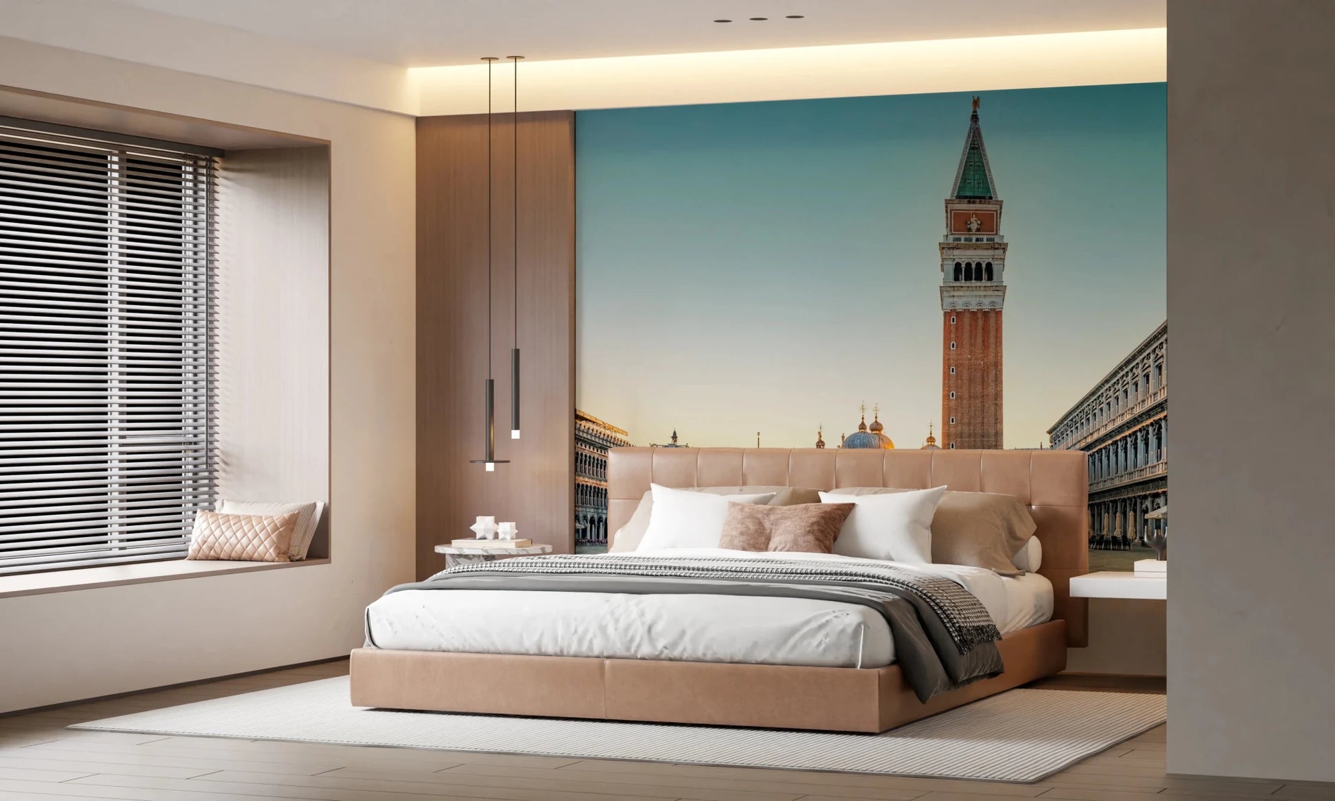 Venetian Sunrise wallpaper mural of St Mark's tower at dawn behind a camel upholstered bed in a bedroom