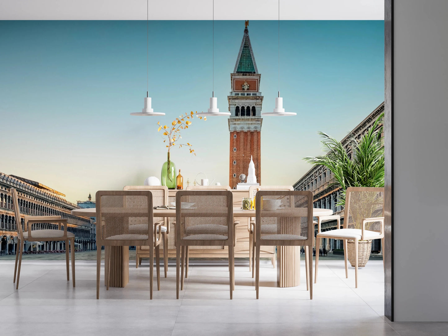 Venetian Sunrise wallpaper mural of the Venice bell tower behind a wood dining table and cane chairs