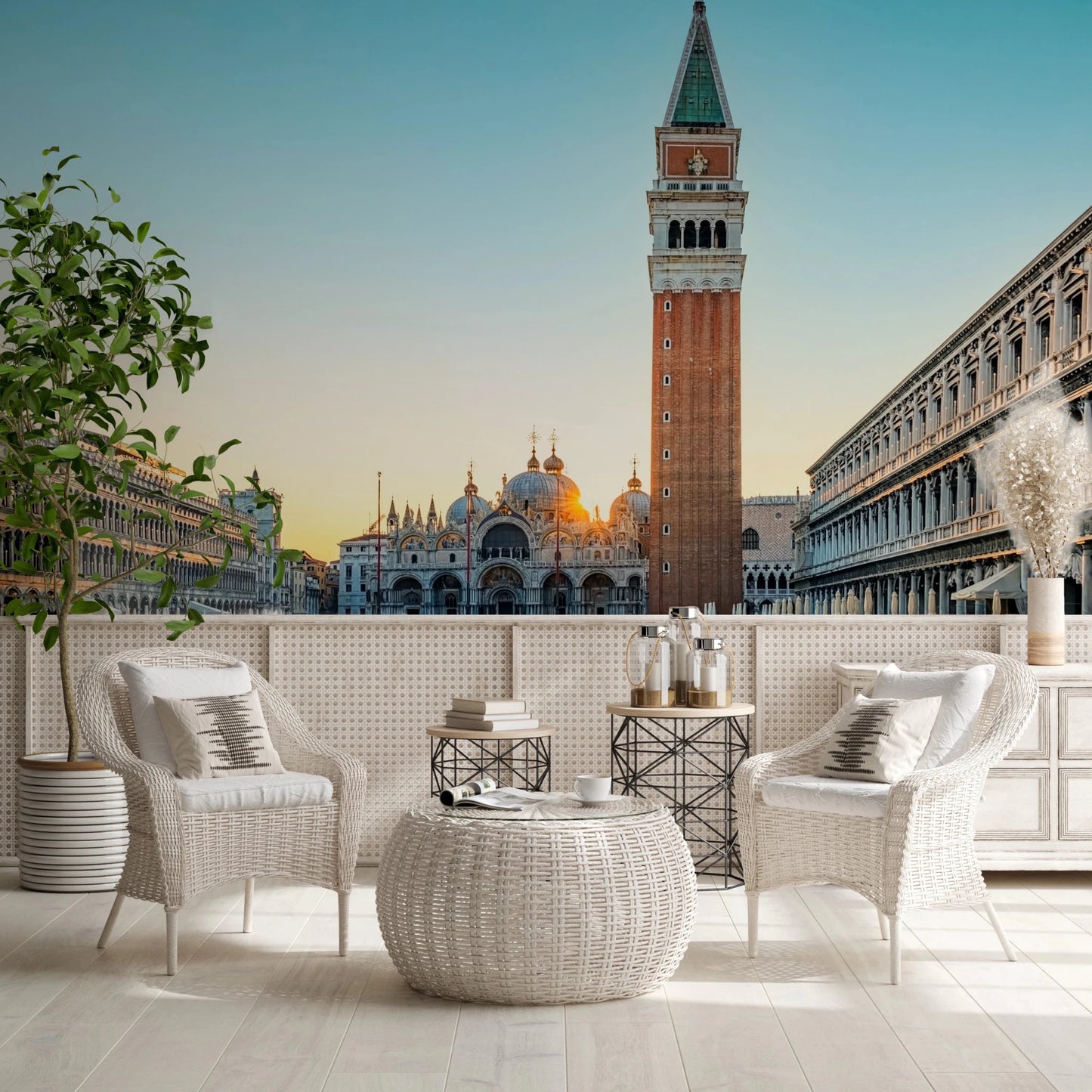 Venetian Sunrise wallpaper mural of the Venice square at sunrise behind white wicker chairs on a terrace