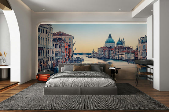 Venetian Serenity wallpaper mural of the Grand Canal at dusk behind a gray platform bed in a bedroom
