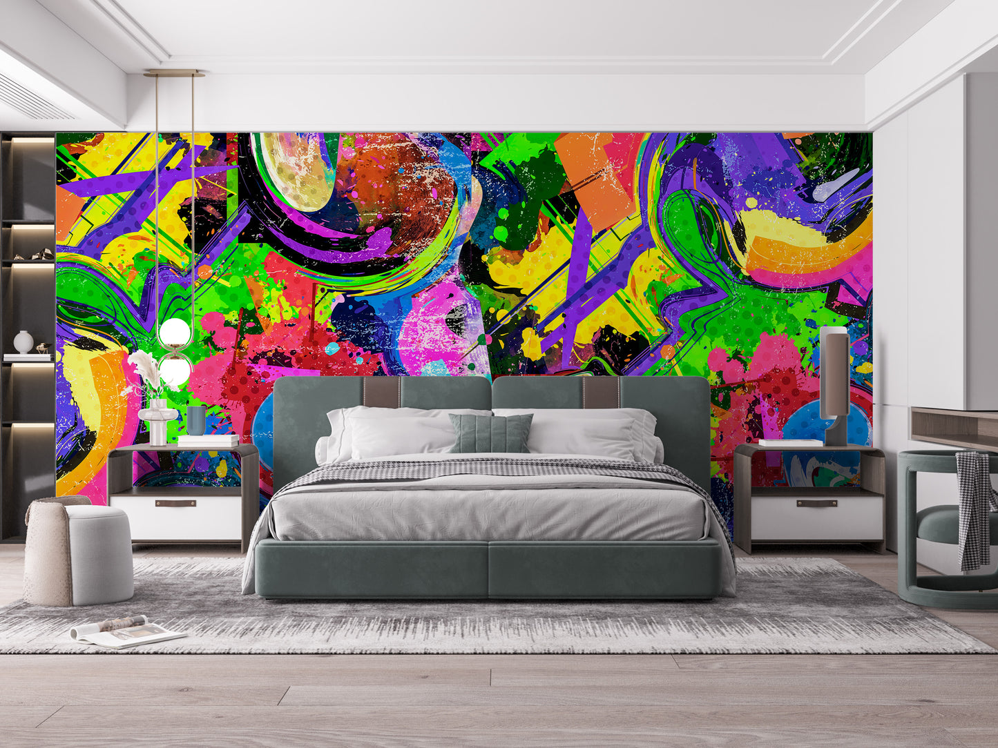 Vibrant Graffiti Splash wallpaper mural of colorful paint splashes behind a grey upholstered bed with white bedding in a bedroom