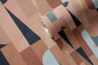 Prisma Green Gouache wall mural close-up showing the geometric pattern in terracotta, navy and pale-blue tones