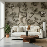 A textured-look wallpaper showing blooming branches with a subtle vintage floral charm.