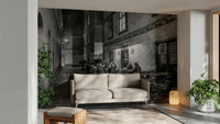 Street cafe in Vienna wallpaper mural of a monochrome evening alley and cafe behind a cream sofa in a living room