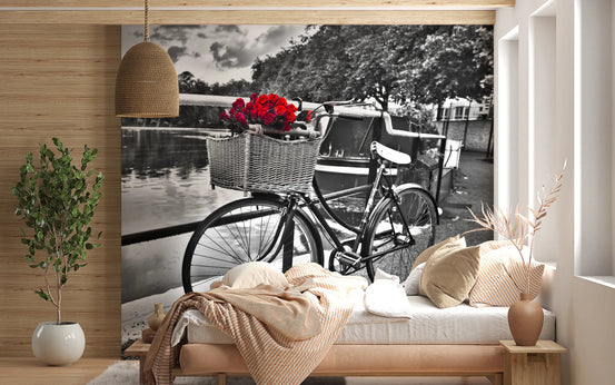 Vintage Bloom Ride wallpaper mural of a black-and-white bike with red roses behind a low wood daybed in a wood-panelled bedroom