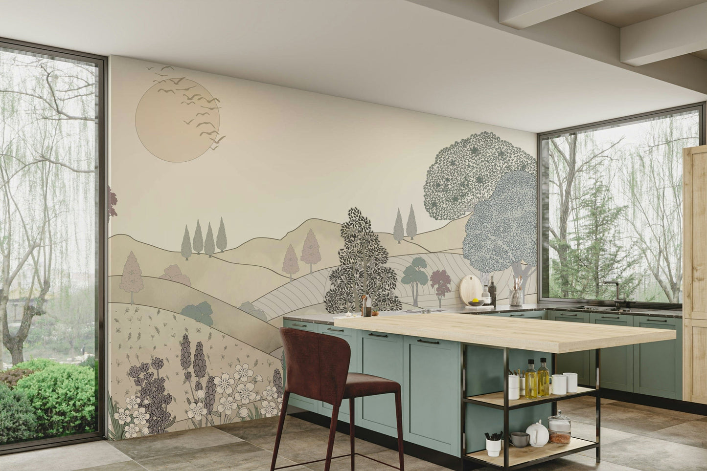 Vintage Bloomscape wallpaper mural of rolling hills and trees above sage green cabinets in a bright kitchen