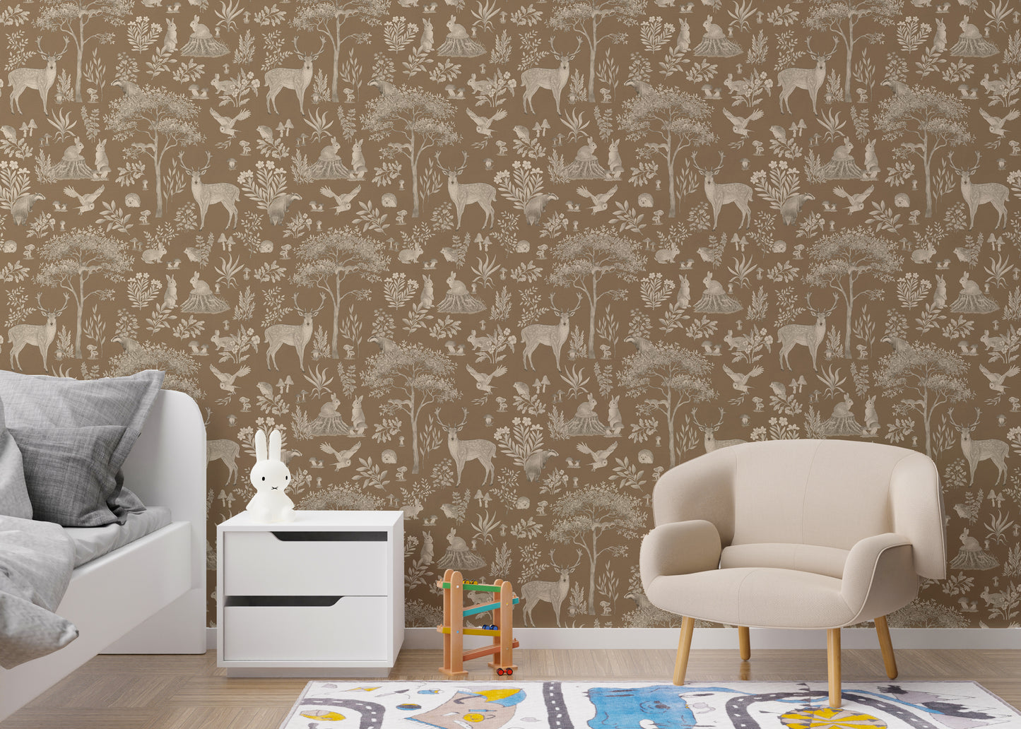 Vintage Brown Wildlife wallpaper behind a white bed, Miffy lamp nightstand and beige armchair in a kids room