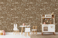 Vintage Brown Wildlife wallpaper behind a round play table, animal stools and a white rattan play kitchen