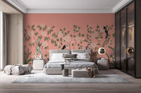 Vintage Chinoiserie Floral wallpaper mural with roses and birds behind a grey platform bed and gold globe lamps