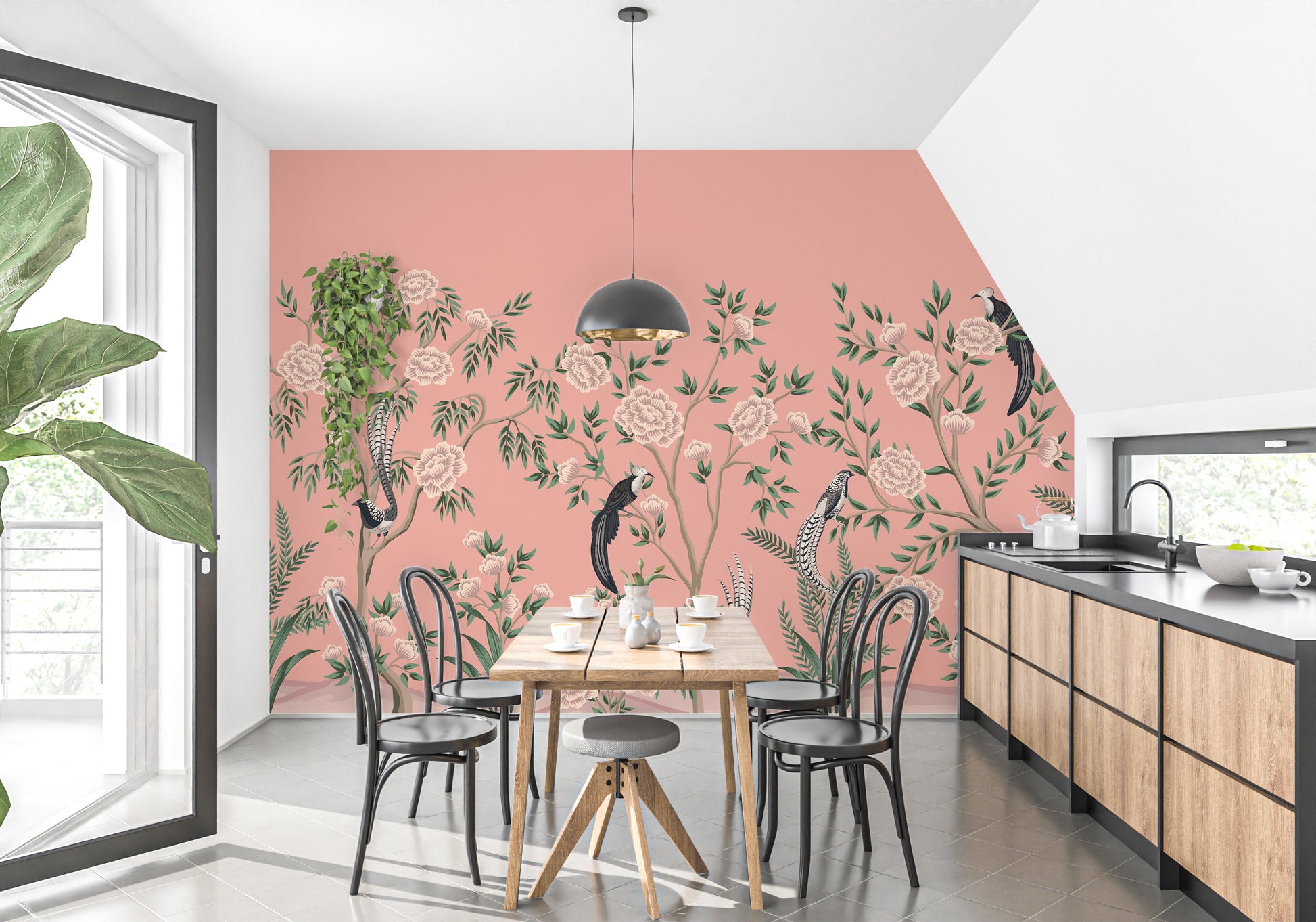 Vintage Chinoiserie Floral wallpaper mural in coral with roses and birds behind a wood dining table and pendant lamp