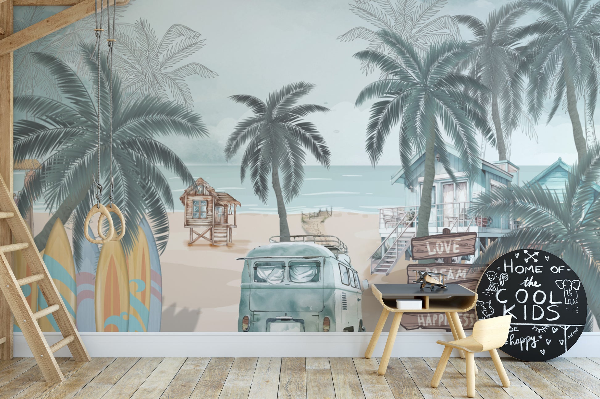 Vintage Coastal Beach wallpaper mural of palms and a campervan in a playroom with surfboards and a chalkboard