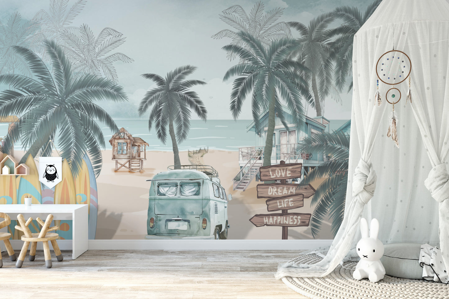 Vintage Coastal Beach wallpaper mural with a campervan and signpost beside a kids table and white play canopy