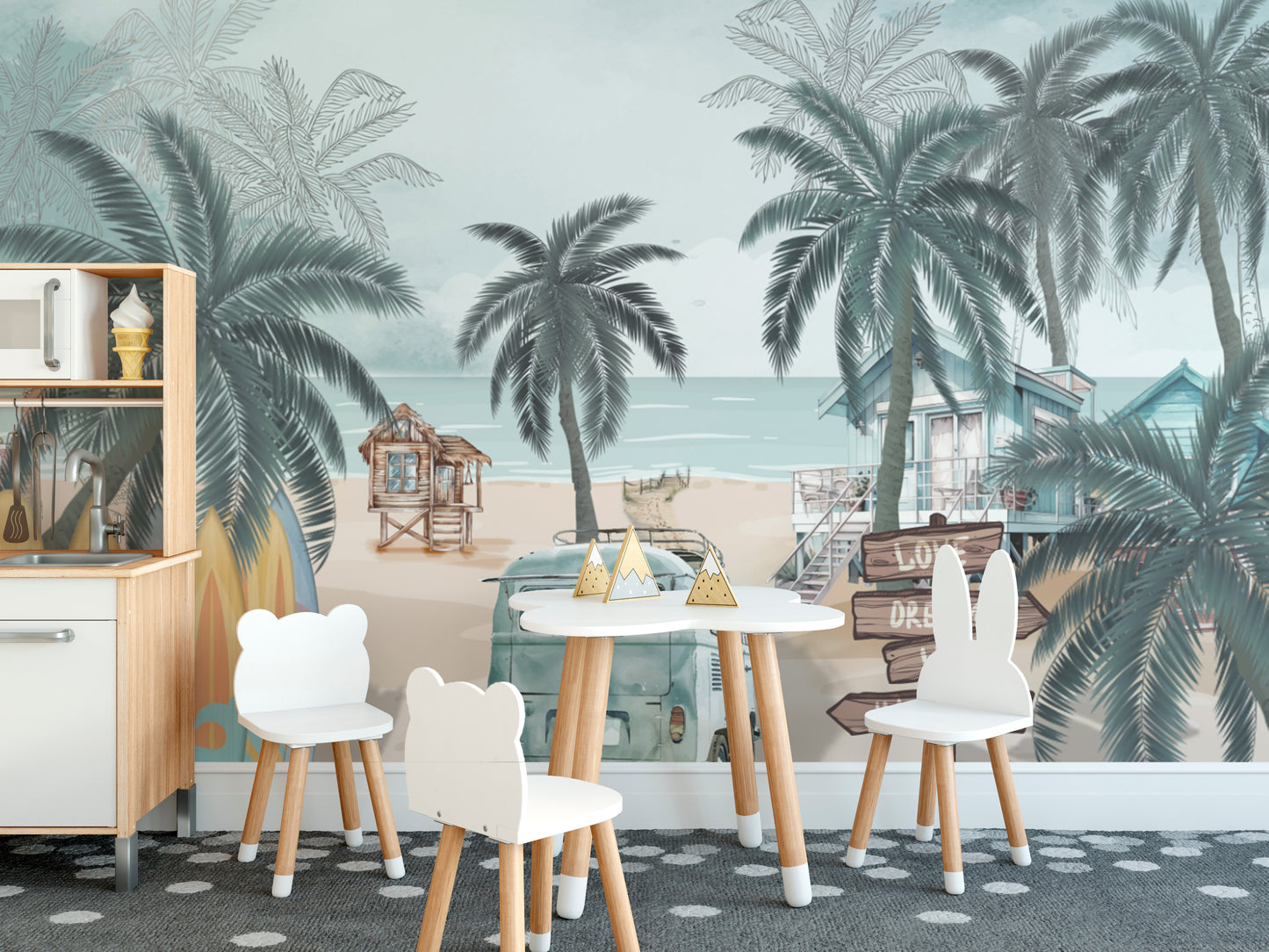 Vintage Coastal Beach wallpaper mural with palms and a beach hut behind a toy kitchen and bear-shaped chairs