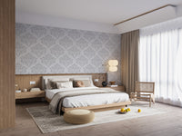 Sophisticated damask repeat wallpaper in grey and white tones.