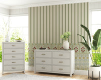 Striped wallpaper border combined with subtle floral wallpaper pattern