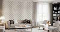 Vintage Floral Whispers wallpaper mural in a living room with a beige Chesterfield sofa and black bookshelf