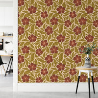 Vintage Flowers Dance wallpaper, terracotta floral pattern beside a round side table in a home office nook