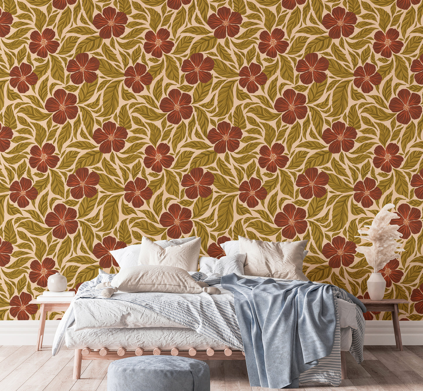 Vintage Flowers Dance wallpaper, rust flowers on tan behind a wood platform bed with a blue throw in a bedroom