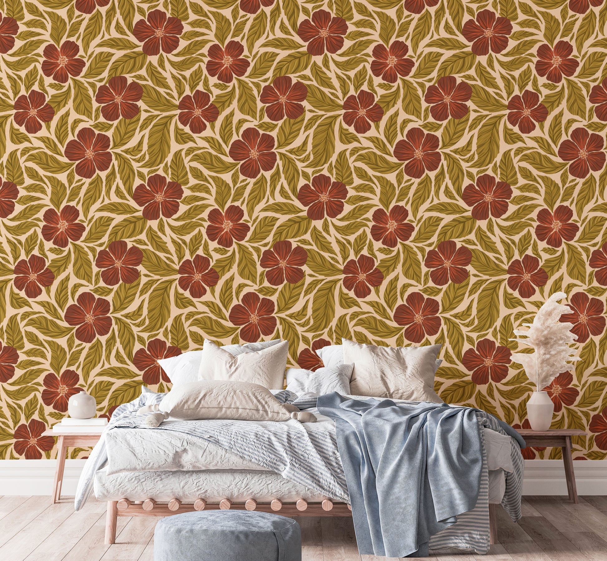 Vintage Flowers Dance wallpaper, rust flowers on tan behind a wood platform bed with a blue throw in a bedroom