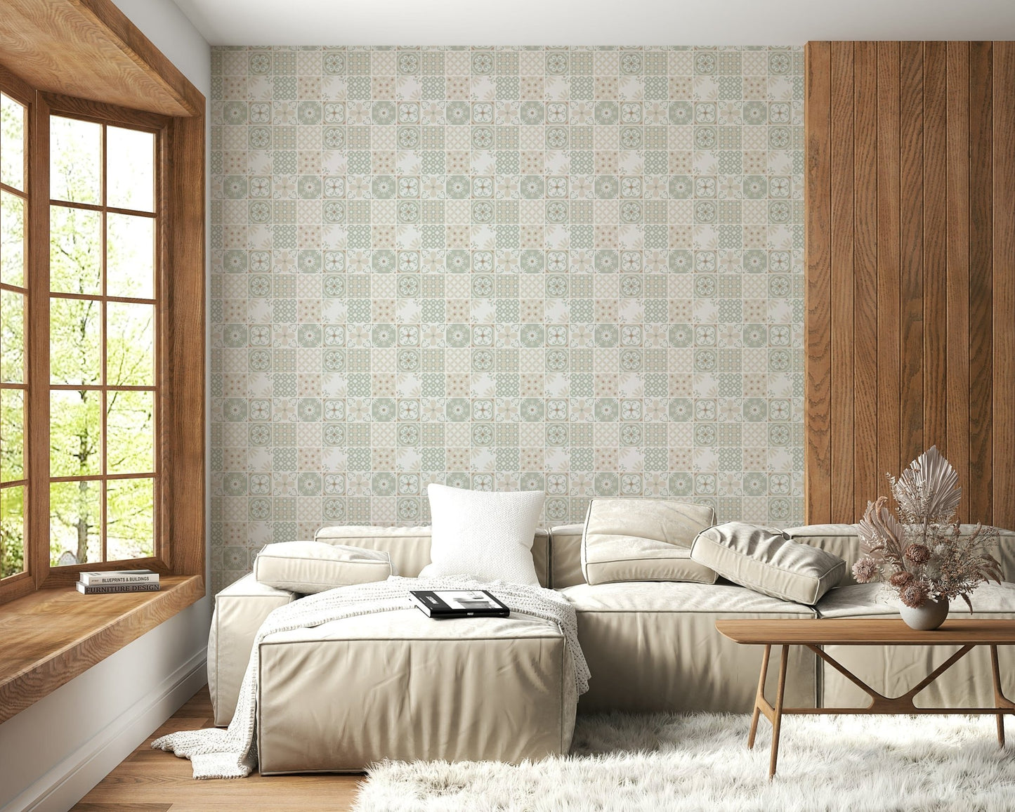 Vintage Folk Tiles Sage Green wallpaper behind a beige sectional sofa near a window seat in a living room
