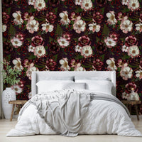 Soft pink roses on a deep blue and purple background

