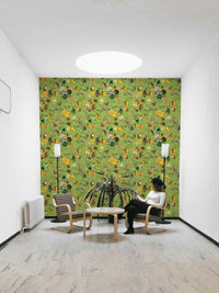 Tropical wallpaper with monkeys perched among flowers and vines.

