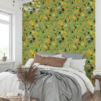 Whimsical jungle mural with monkeys and intricate botanical details.

