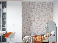 Vintage wallpaper with romantic florals on a textured base.

