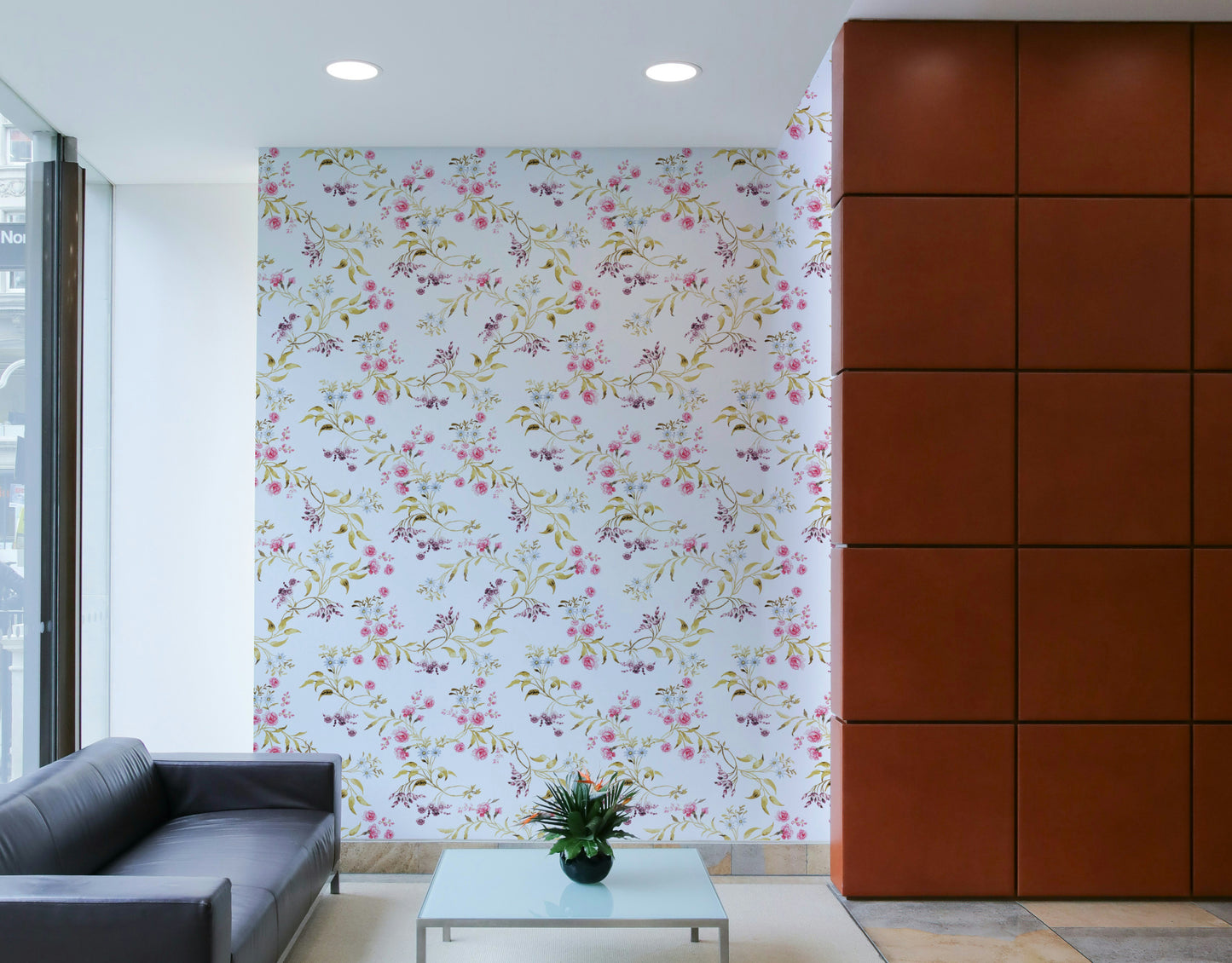Vintage-style wallpaper with roses in pastel pinks and greens.

