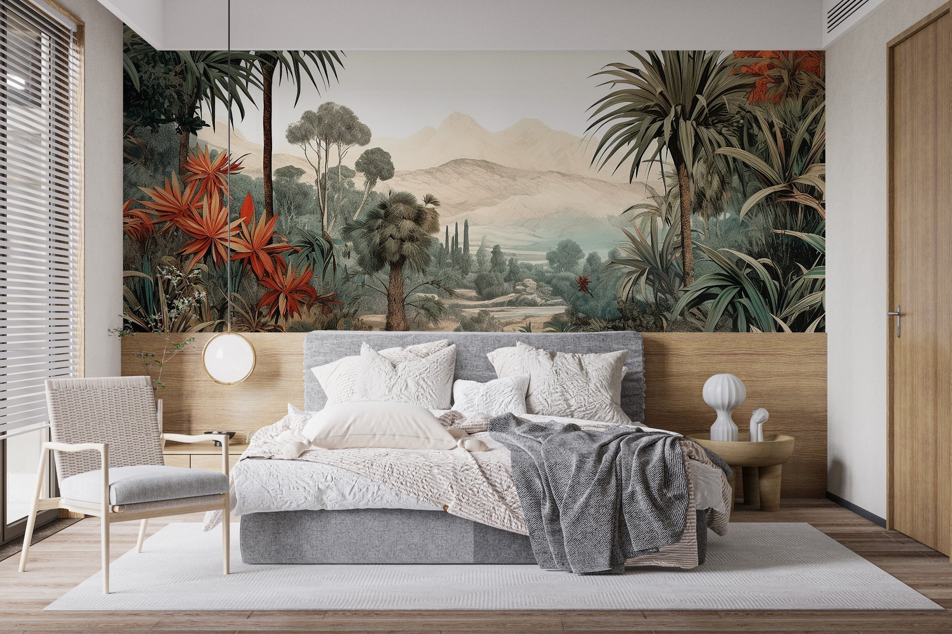 Verdant Valley Vintage Tropical Flora mural of a tropical valley behind a gray bed and rattan chair in a bedroom