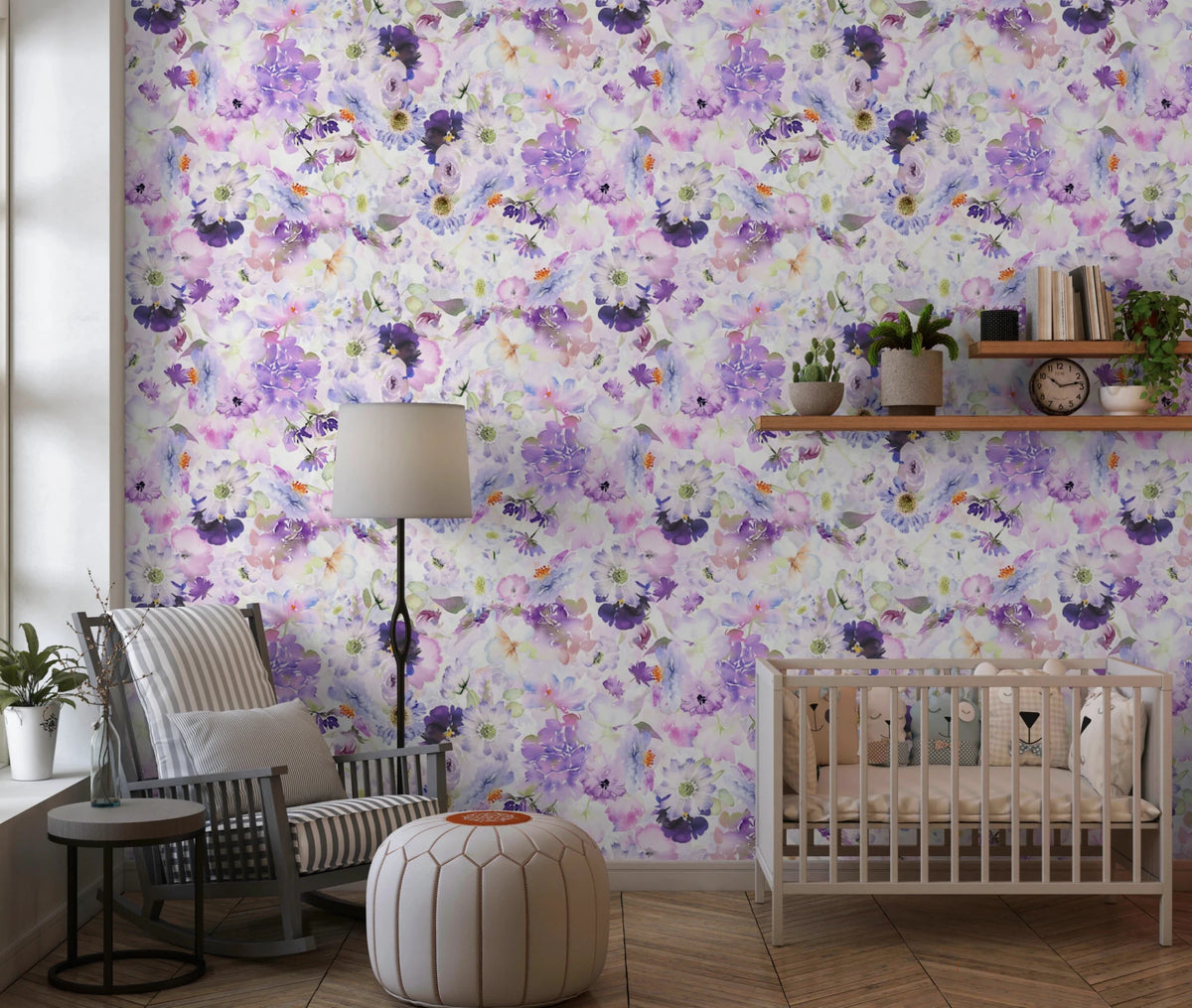 Violet Floral Bloomscape wallpaper mural of purple and white blooms behind a grey rocking chair and white crib in a nursery