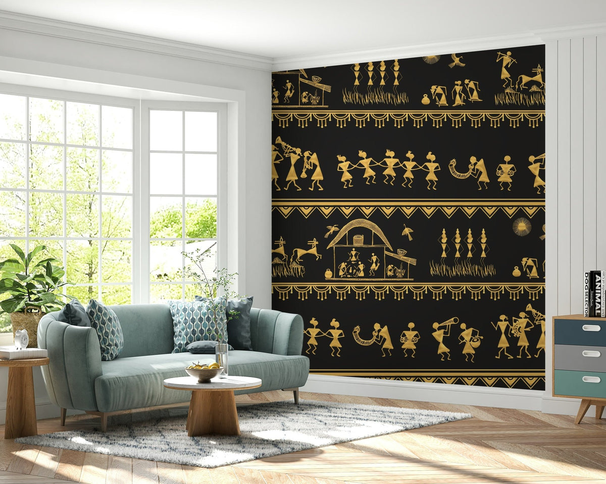 Hand-painted Warli art mural with tribal figures, huts, and musical celebrations