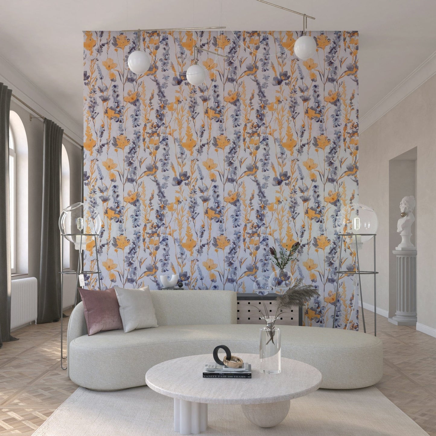 Warm Meadow Harmony wallpaper of orange and grey florals behind a cream curved sofa in an elegant living room