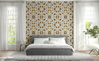 Geometric wall mural with warm-toned triangle patterns in shades of beige, terracotta, and gold.