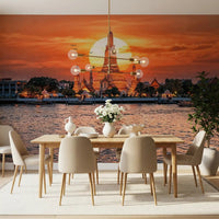 Dining room with Wat Arun wall mural and warm evening skyline