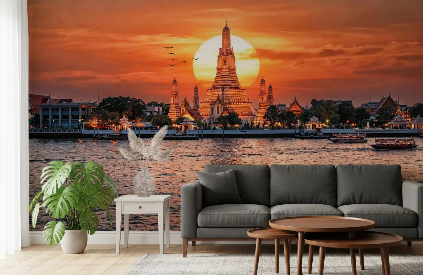 Living room with Wat Arun wall mural and glowing skyline backdrop
