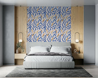 Watercolor botanical mural showcasing soft blue florals with golden highlights.