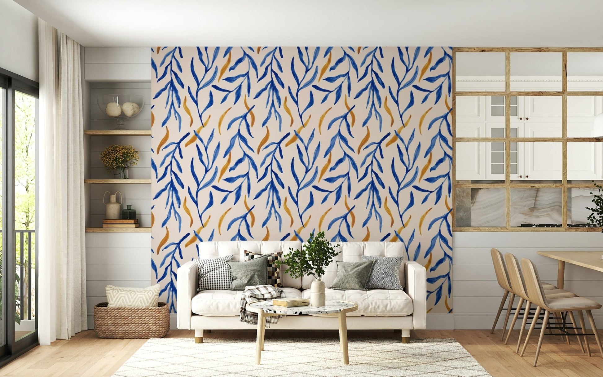 Nature-inspired print featuring watercolor leaves in blue with shimmering gold touches.