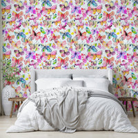 Close-up of watercolor butterflies with fine brushstrokes.


