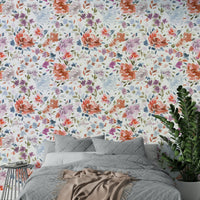 Artistic floral wallpaper combining warm reds and calming blues.

