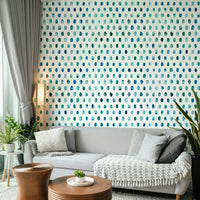Abstract wallpaper featuring blue watercolor dots on white background.

